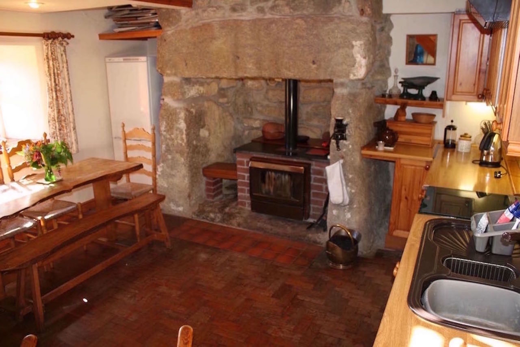 Kitchen towards dining table and window