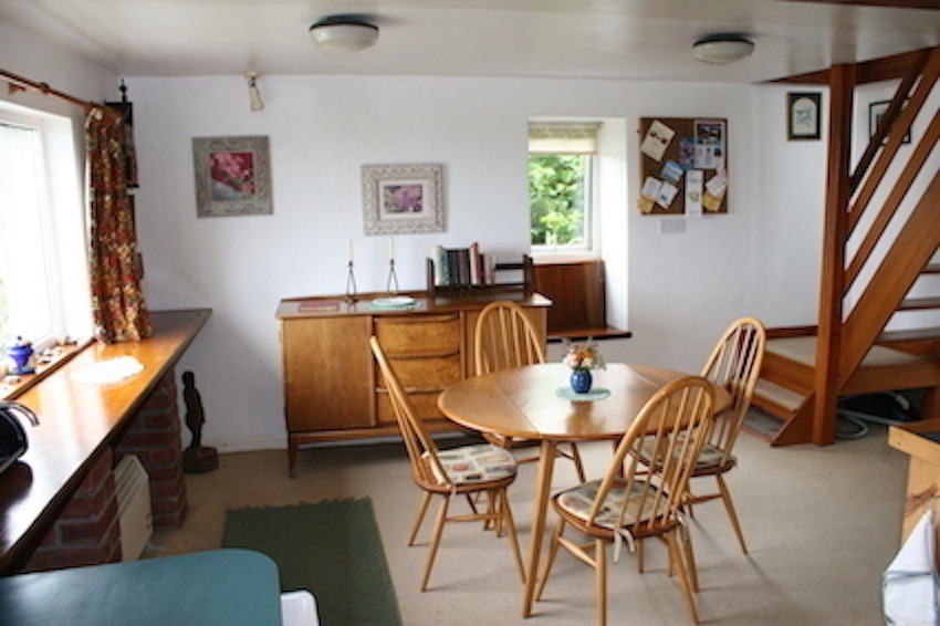 loftdining room with stairs