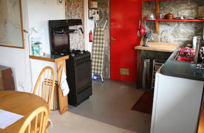 Loft kitchen stove.red door